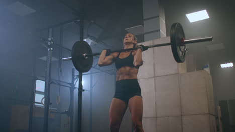 Strong-Woman-Weightlifting.-Athletic-Beautiful-Woman-Does-Overhead-Deadlift-with-a-Barbell-in-the-Gym.-Gorgeous-Female-Professional-Bodybuilder-Workout-Weight-Lift-Exercises-in-the-Authentic-Fit